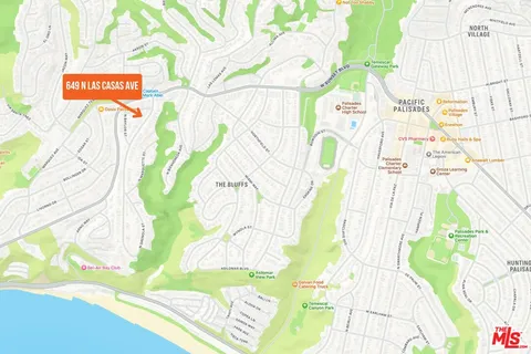 a view of a street with an outdoor space