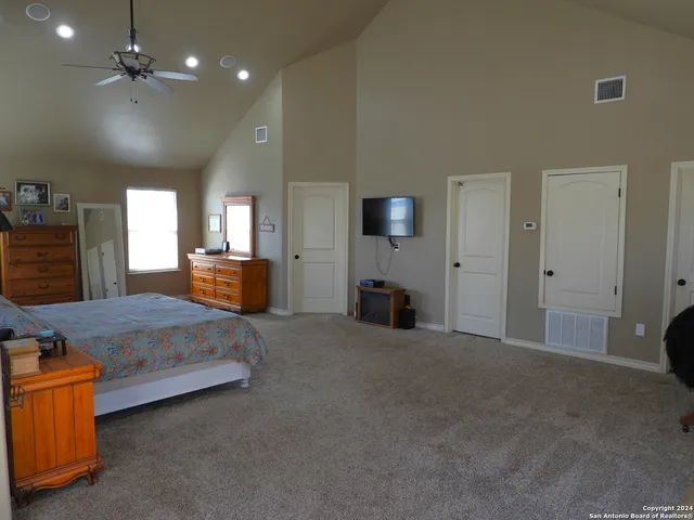 a en suite bathroom with a sink and a mirror