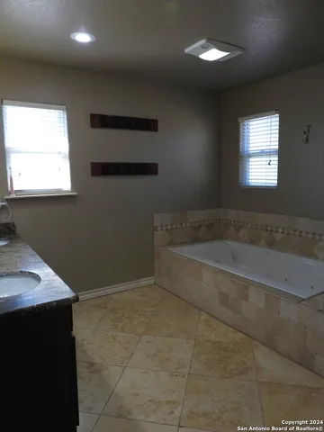a view of balcony with wooden floor and city view