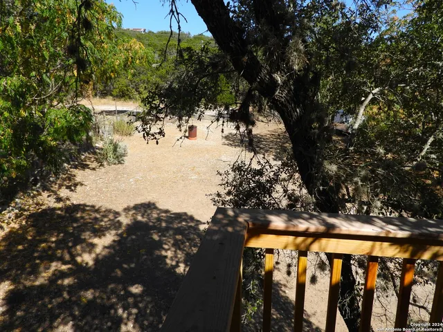 a view of a backyard of the house