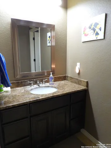 a room with a table and chairs