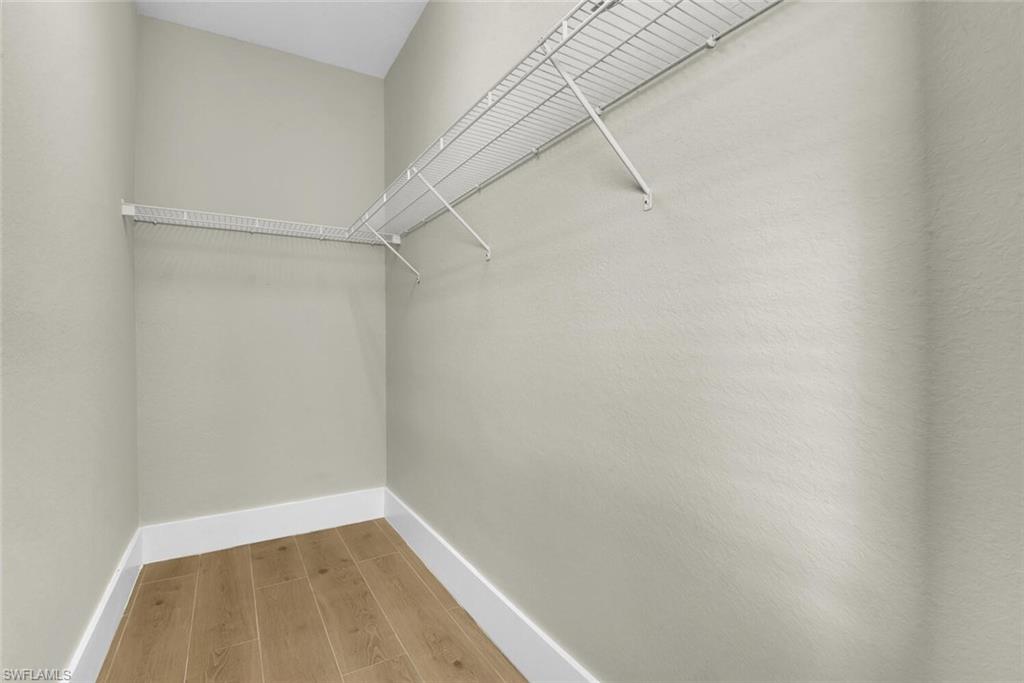 8883 Falcon Pointe Loop Fort Myers, FL 33912 - Photo 22 of 49 a view of small space with racks on the wall