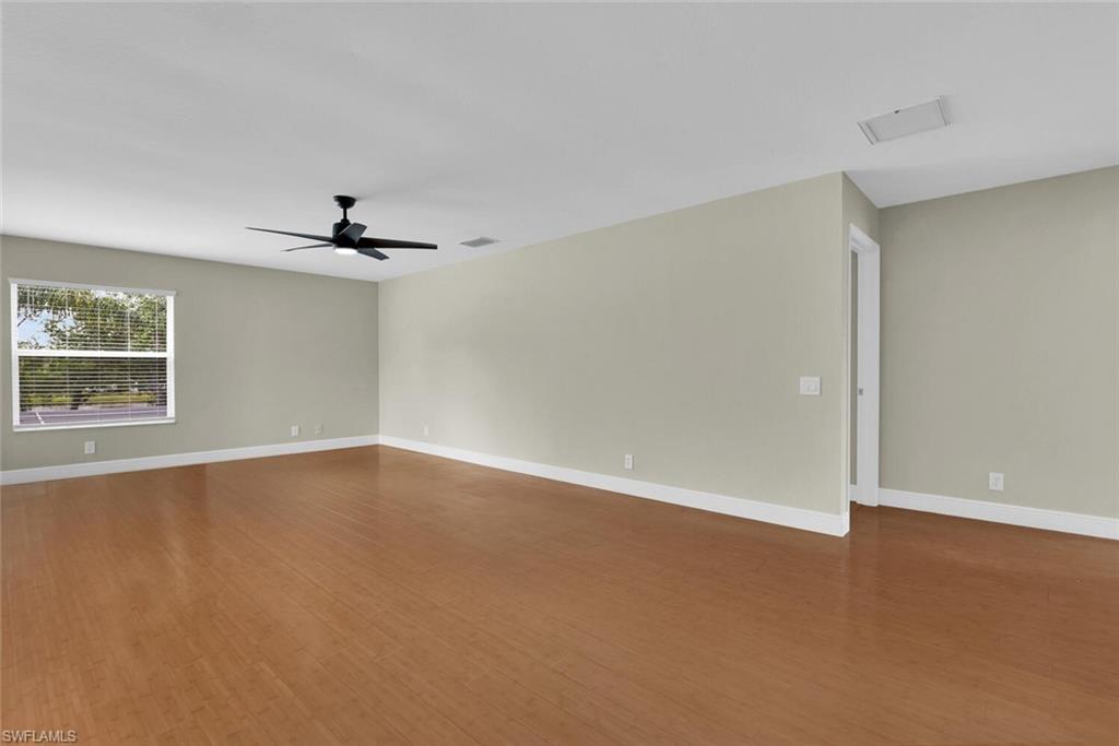 8883 Falcon Pointe Loop Fort Myers, FL 33912 - Photo 27 of 49 a view of an empty room with a window