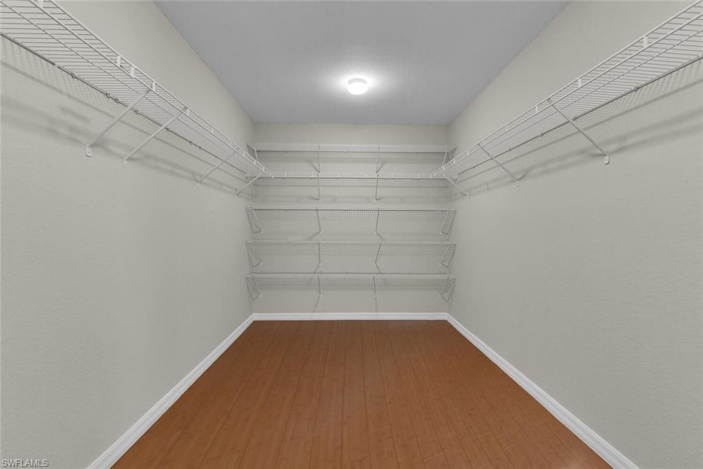 8883 Falcon Pointe Loop Fort Myers, FL 33912 - Photo 32 of 49 a view of a room with empty racks