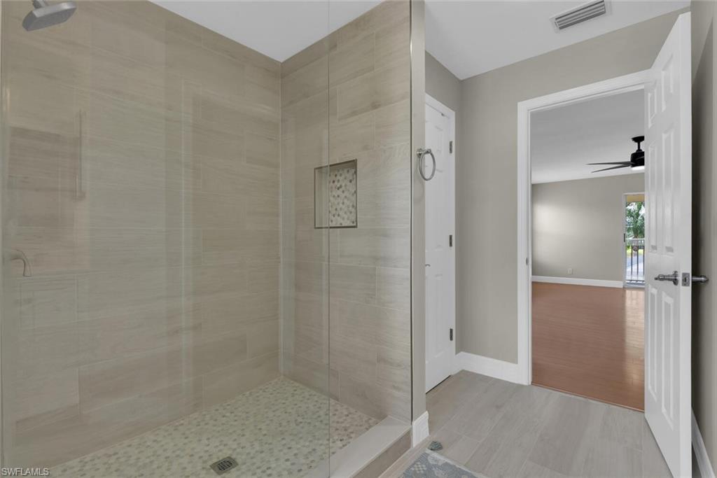 8883 Falcon Pointe Loop Fort Myers, FL 33912 - Photo 35 of 49 a bathroom with a shower