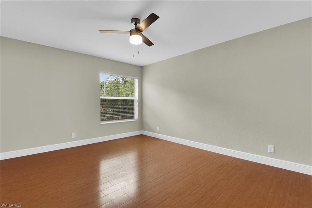 8883 Falcon Pointe Loop Fort Myers, FL 33912 - Photo 40 of 49 an empty room with a window