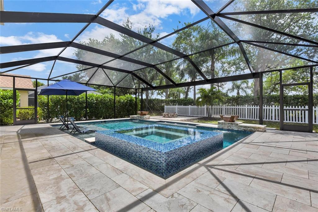 8883 Falcon Pointe Loop Fort Myers, FL 33912 - Photo 4 of 49 a view of indoor pool and sitting area