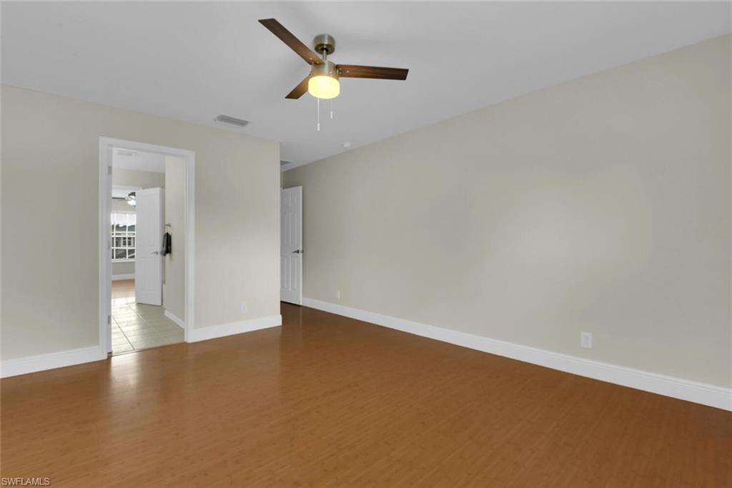 8883 Falcon Pointe Loop Fort Myers, FL 33912 - Photo 41 of 49 an empty room with a window