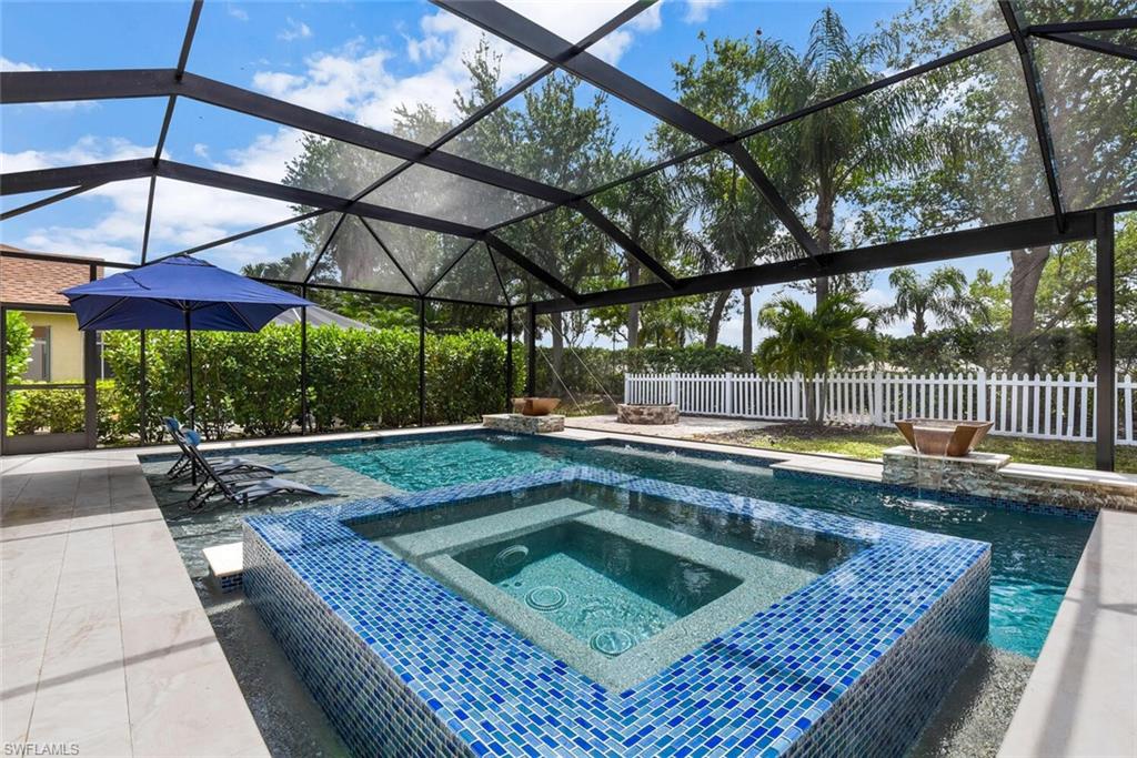 8883 Falcon Pointe Loop Fort Myers, FL 33912 - Photo 5 of 49 a view of swimming pool with a patio