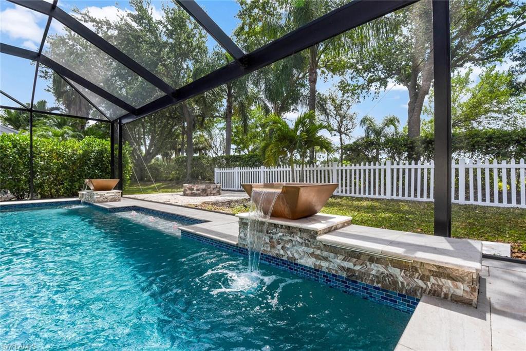 8883 Falcon Pointe Loop Fort Myers, FL 33912 - Photo 6 of 49 a garden view with a seating space