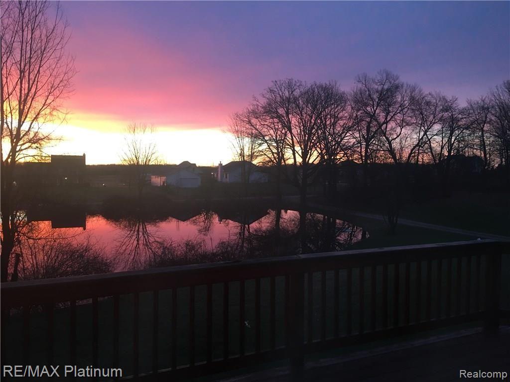 2755 North Hughes Road Howell, MI 48855 - Photo 57 of 57 Beautiful Sunrises from the deck overlooking the pond.