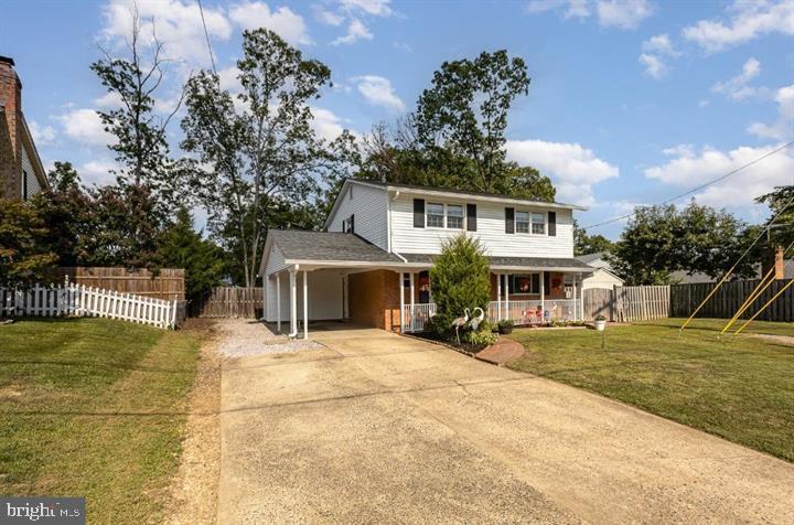6919 Rolling Road Springfield, VA 22152 - Photo 1 of 20 Two-story detached home with spacious yard.
