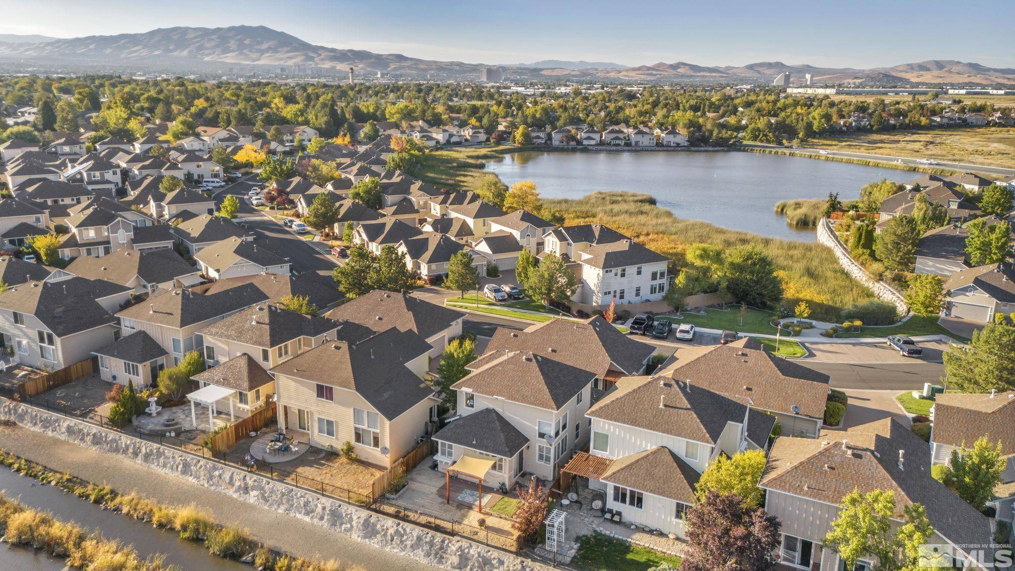 3713 Heron's Landing Drive Reno, NV 89502 - Photo 2 of 35 an aerial view of residential building with outdoor space and river