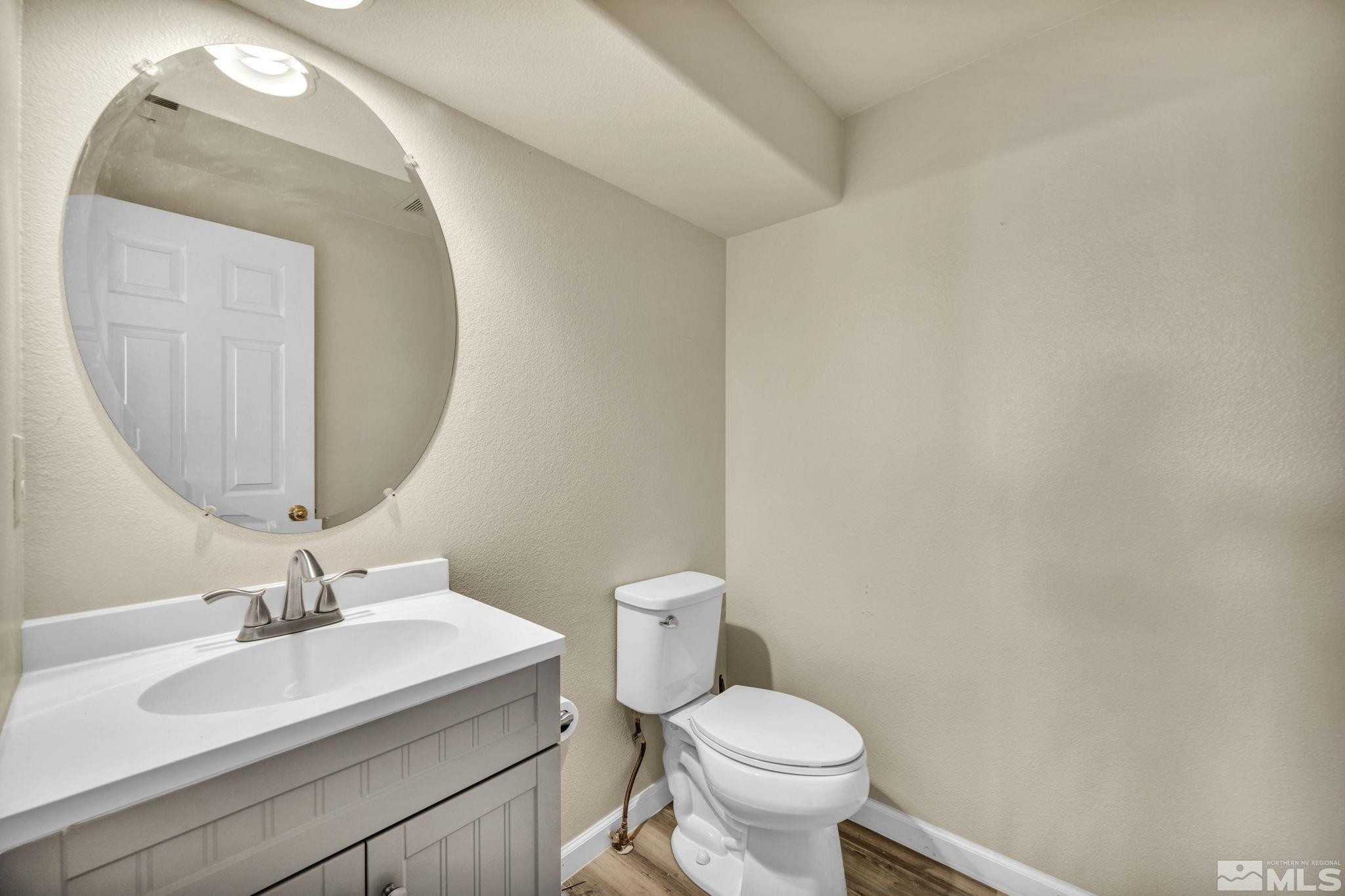 3713 Heron's Landing Drive Reno, NV 89502 - Photo 22 of 35 a bathroom with a sink and a mirror