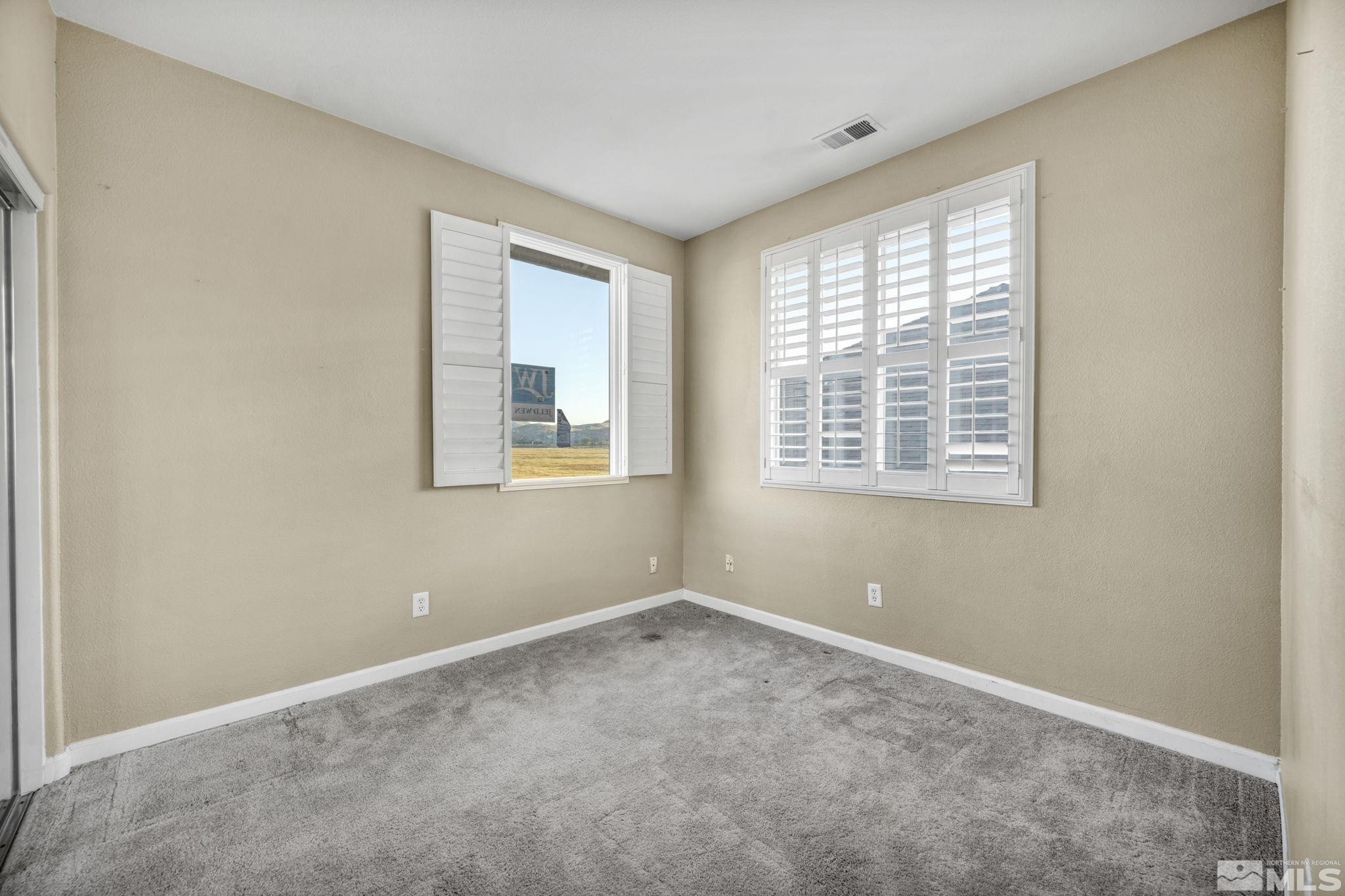 3713 Heron's Landing Drive Reno, NV 89502 - Photo 23 of 35 a view of an empty room with a window