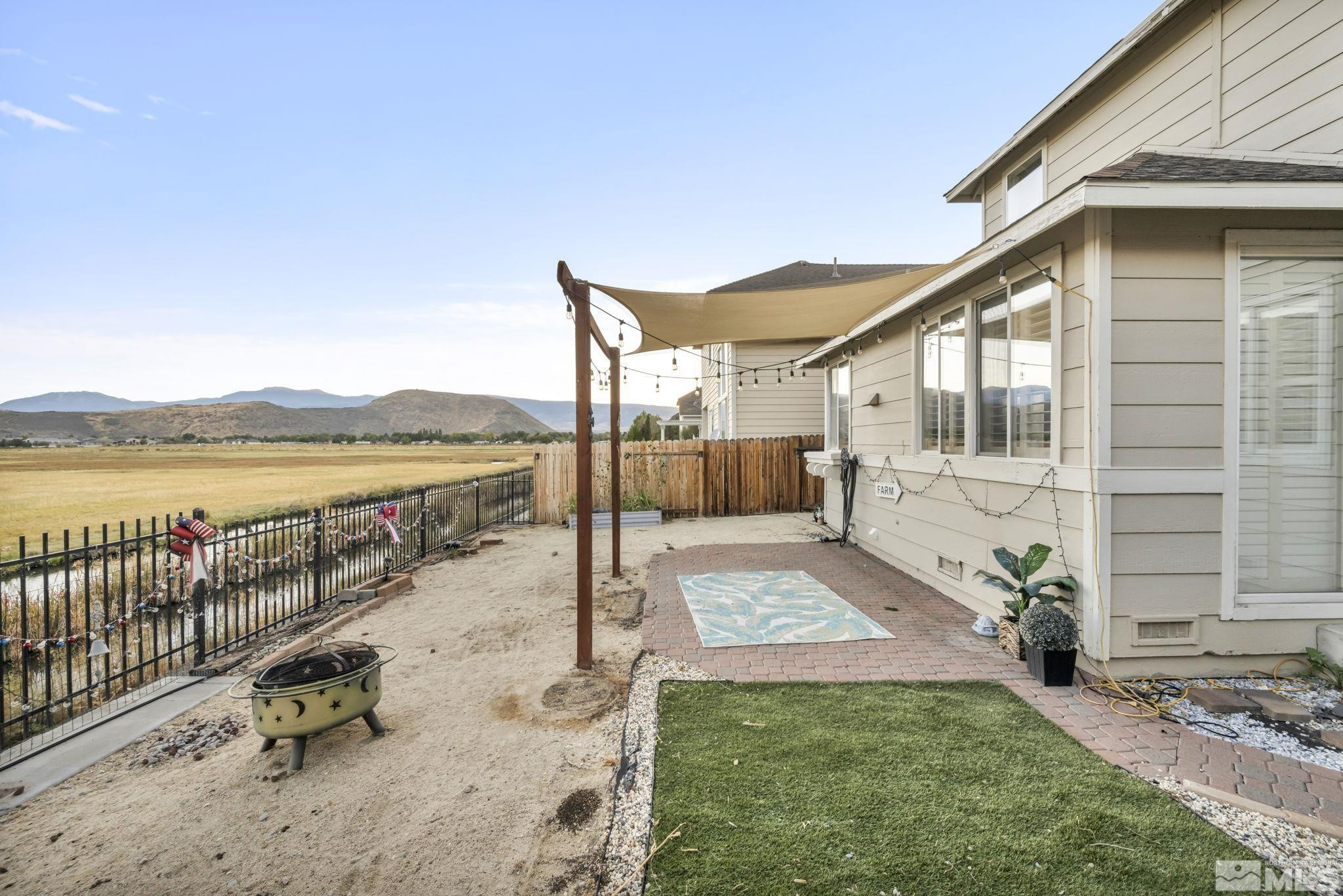 3713 Heron's Landing Drive Reno, NV 89502 - Photo 27 of 35 a view of a house with backyard and sitting area