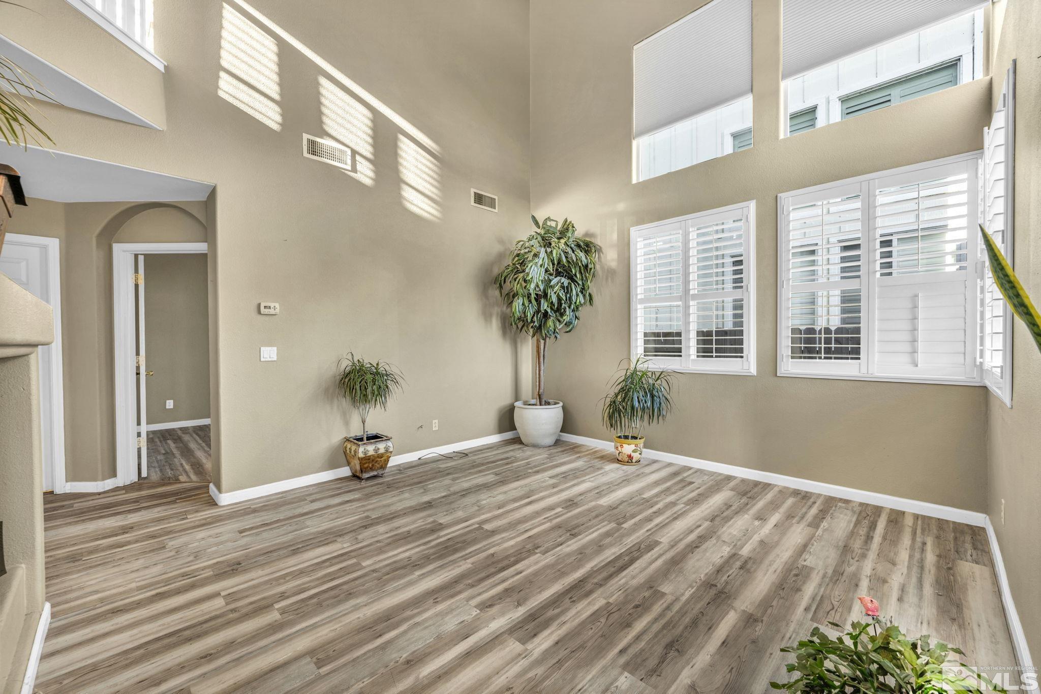 3713 Heron's Landing Drive Reno, NV 89502 - Photo 7 of 35 a view of a lobby room with wooden floor and windows