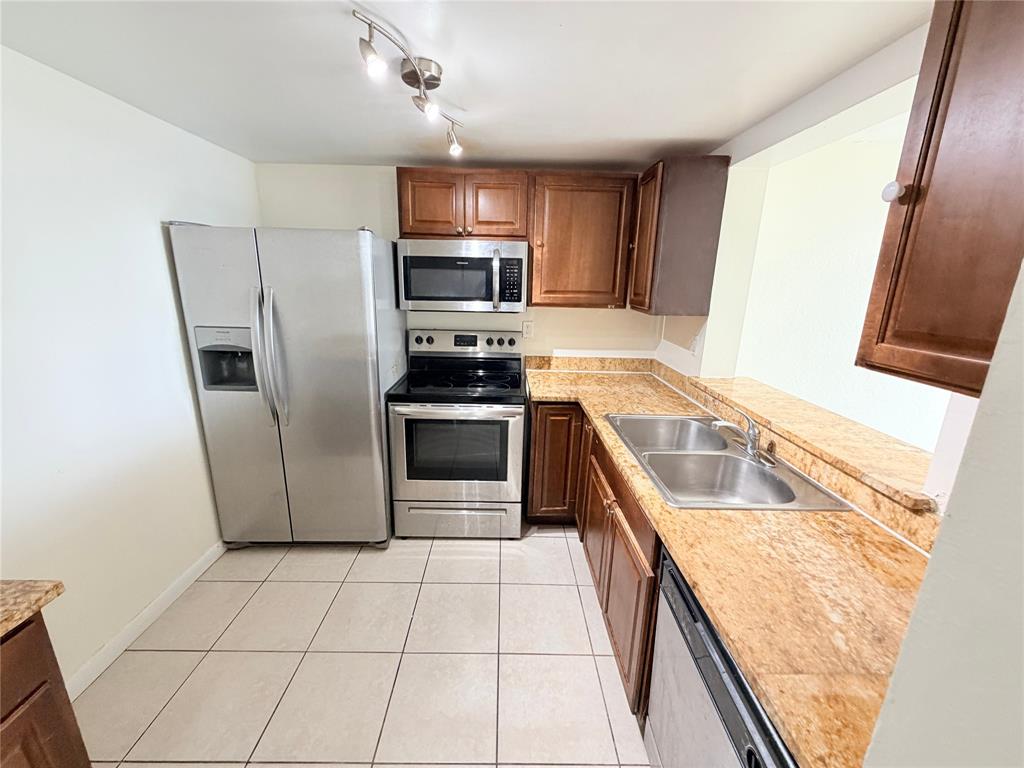 496 Northwest 165th Street, Unit D409 Miami, FL 33169 - Photo 4 of 20