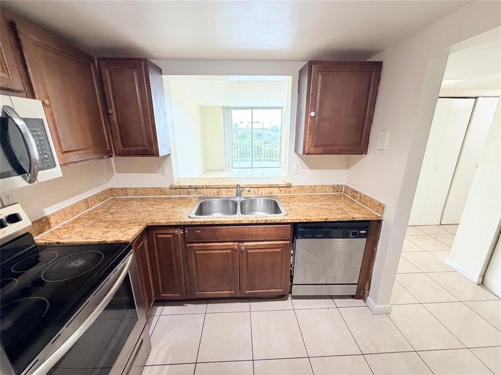 496 Northwest 165th Street, Unit D409 Miami, FL 33169 - Photo 5 of 20