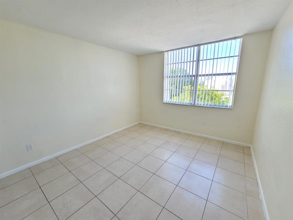 496 Northwest 165th Street, Unit D409 Miami, FL 33169 - Photo 6 of 20