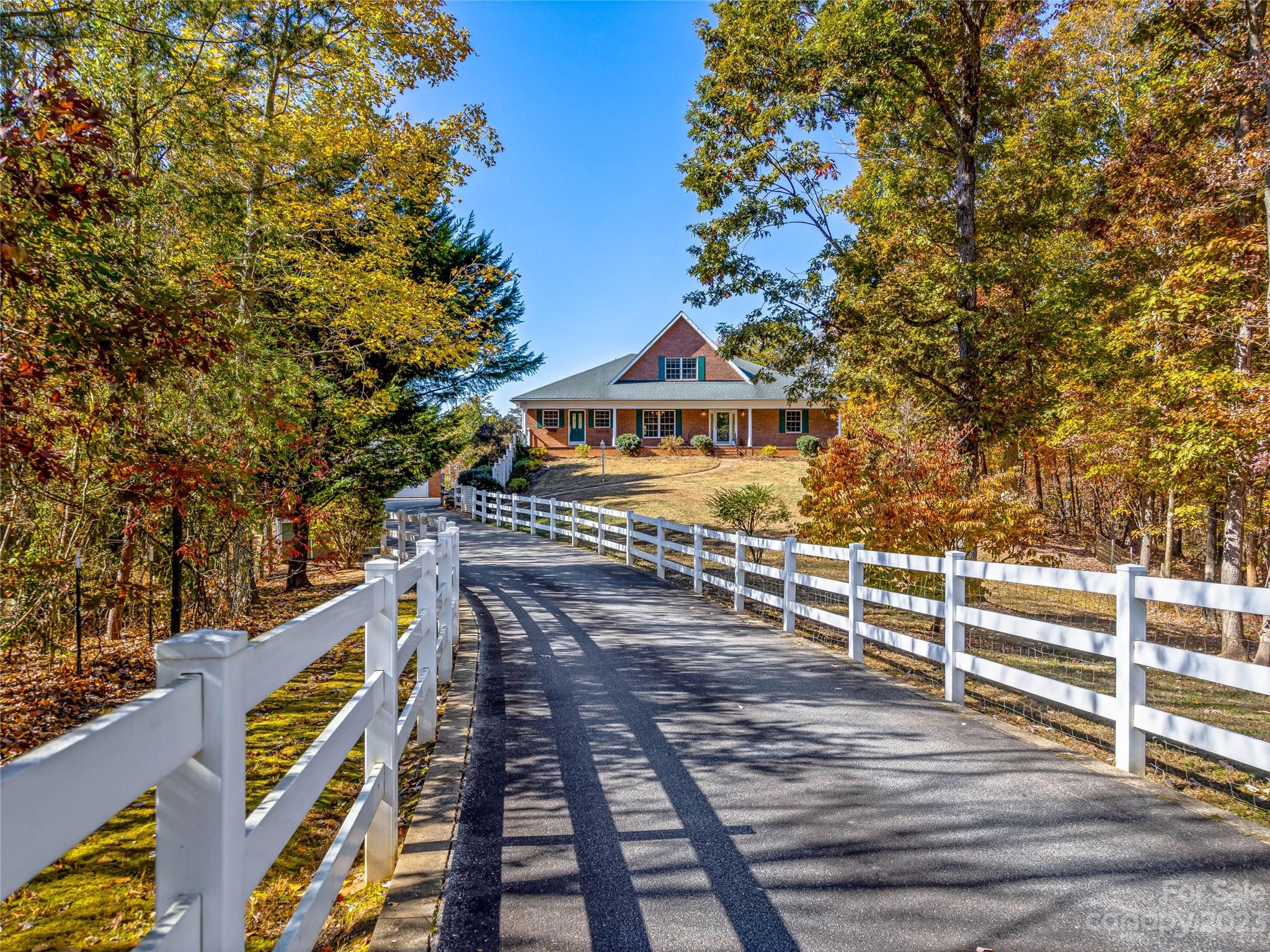 263 Sylvan Lane Mill Spring, NC 28756 - Photo 1 of 45 a view of an outdoor space with a street