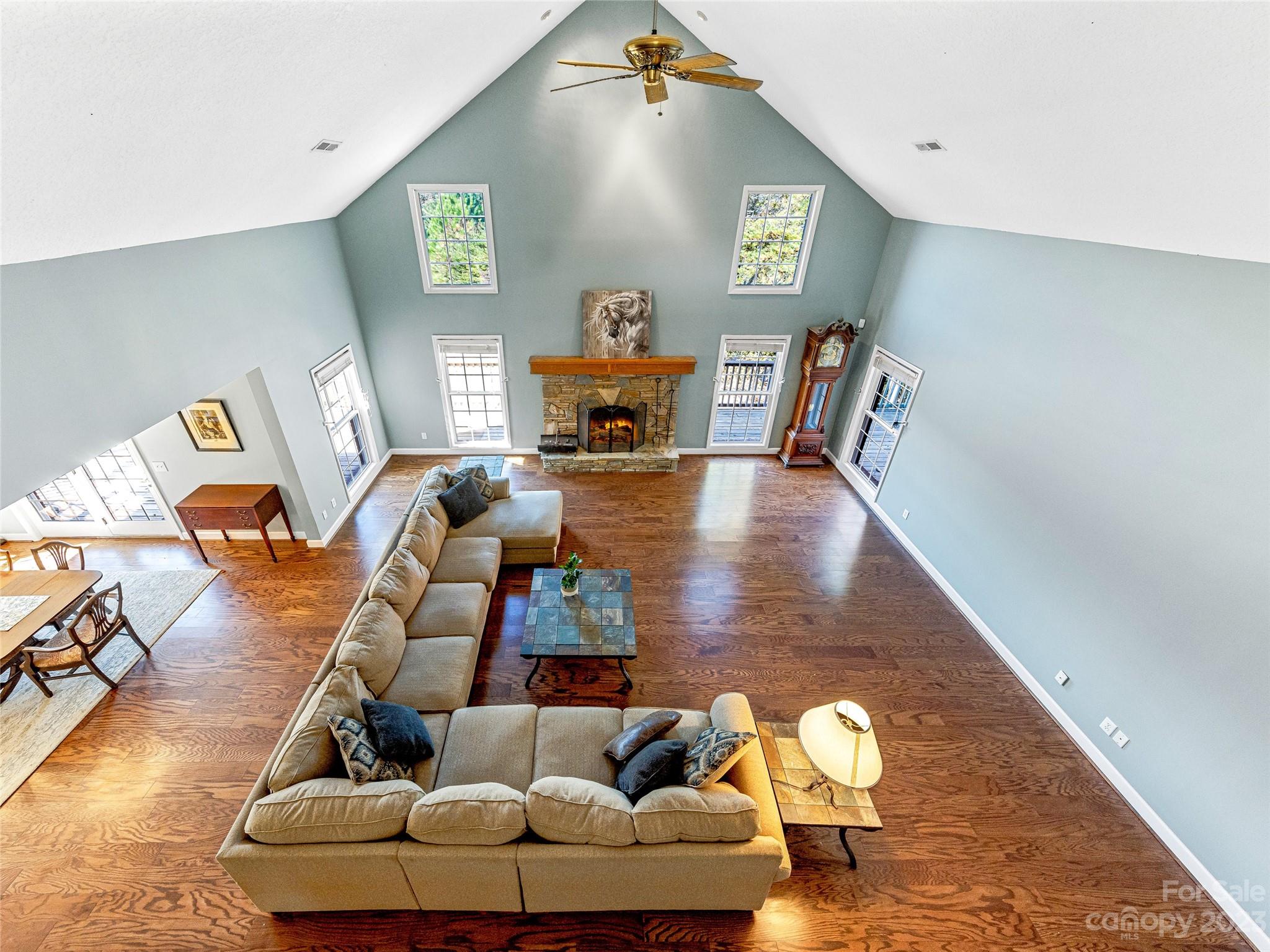 263 Sylvan Lane Mill Spring, NC 28756 - Photo 13 of 45 a living room with furniture and wooden floor