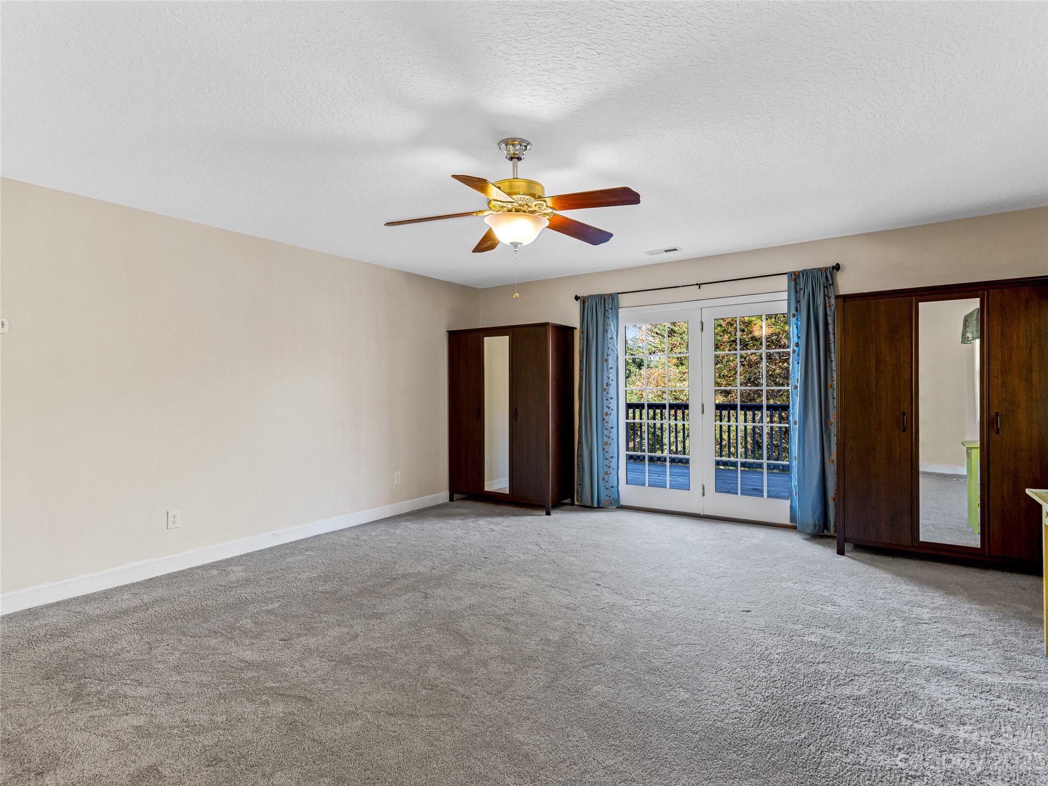 263 Sylvan Lane Mill Spring, NC 28756 - Photo 18 of 45 a view of an empty room with a window