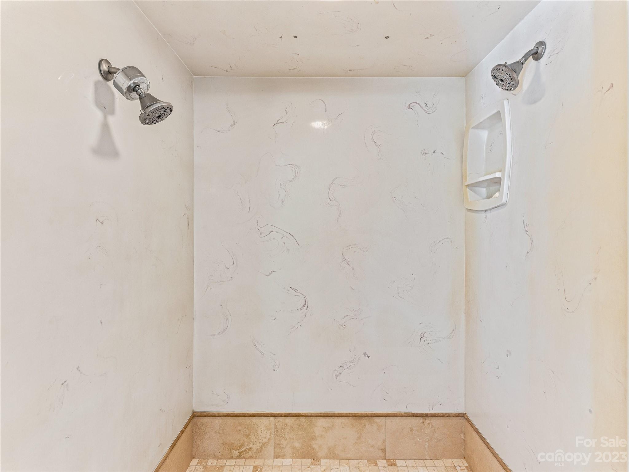 263 Sylvan Lane Mill Spring, NC 28756 - Photo 21 of 45 a bathroom with a shower