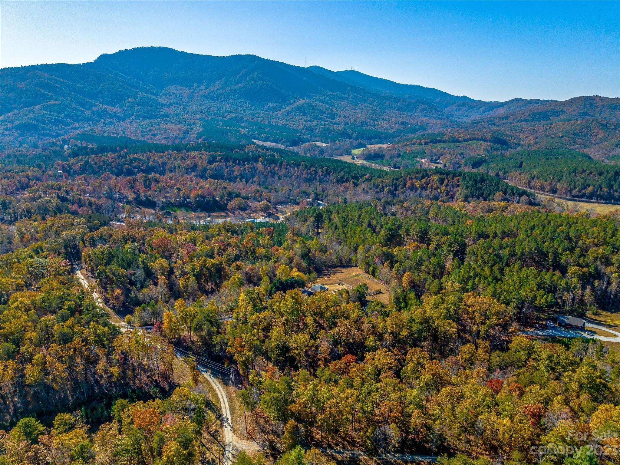 263 Sylvan Lane Mill Spring, NC 28756 - Photo 34 of 45 a view of a city and mountains