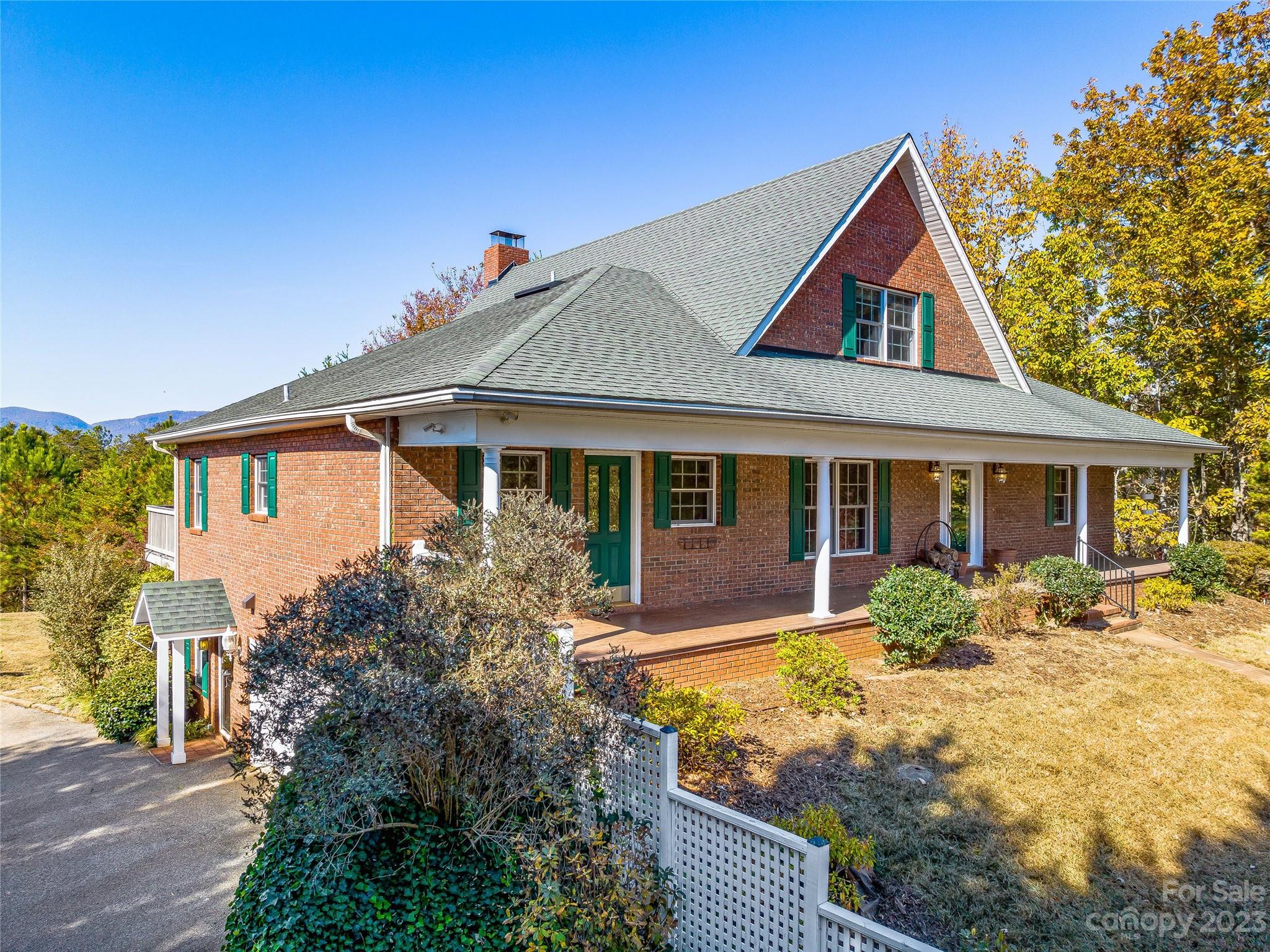 263 Sylvan Lane Mill Spring, NC 28756 - Photo 4 of 45 a front view of a house with yard