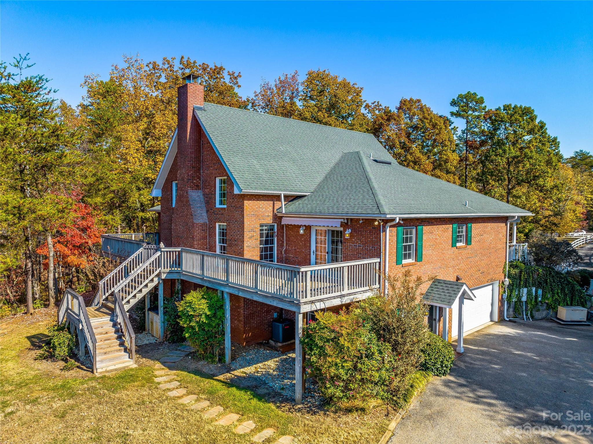 263 Sylvan Lane Mill Spring, NC 28756 - Photo 5 of 45 front view of a house with a yard