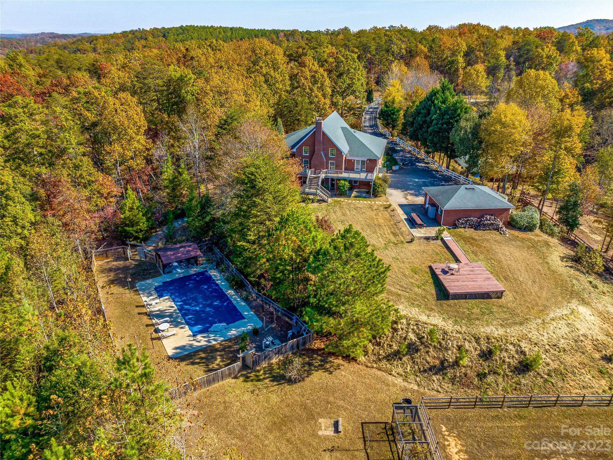 263 Sylvan Lane Mill Spring, NC 28756 - Photo 7 of 45 a view of a house with a yard