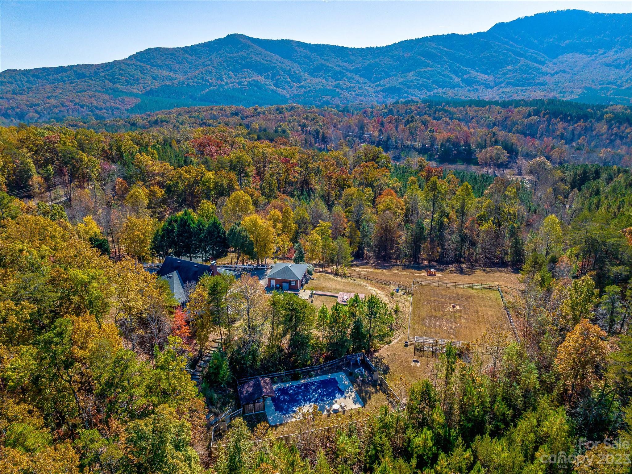 263 Sylvan Lane Mill Spring, NC 28756 - Photo 8 of 45 a view of a house with a yard