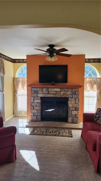 3865 Piney Dam Road Clarion, PA 16214 - Photo 15 of 41 a living room with furniture a flat screen tv and a fireplace