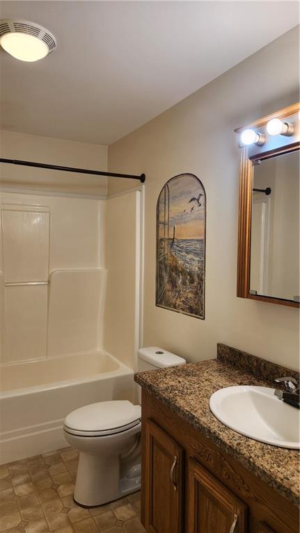 3865 Piney Dam Road Clarion, PA 16214 - Photo 19 of 41 a bathroom with a granite countertop bathtub sink vanity mirror and toilet