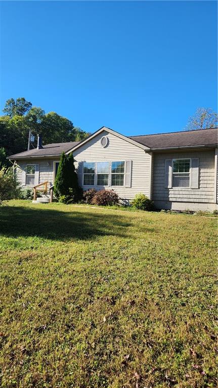 3865 Piney Dam Road Clarion, PA 16214 - Photo 2 of 41 a front view of a house with a yard
