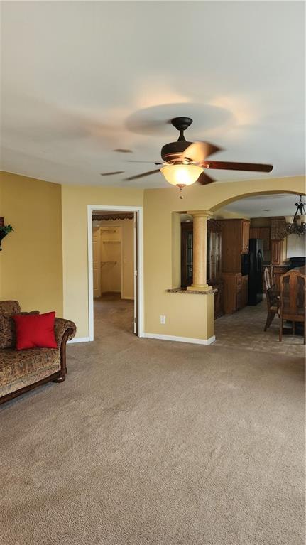 3865 Piney Dam Road Clarion, PA 16214 - Photo 23 of 41 a view of a livingroom with furniture and a ceiling fan