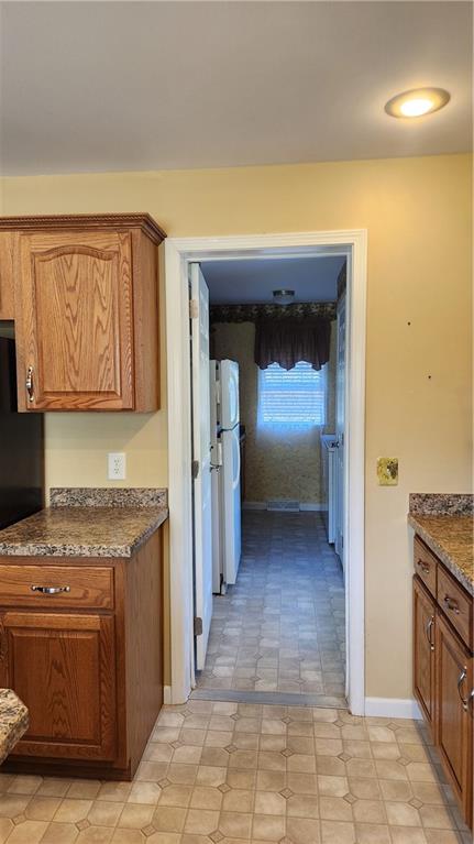 3865 Piney Dam Road Clarion, PA 16214 - Photo 29 of 41 a view of a kitchen with a sink cabinets and a window