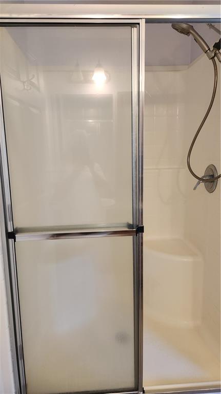 3865 Piney Dam Road Clarion, PA 16214 - Photo 36 of 41 a bathroom with a glass shower door