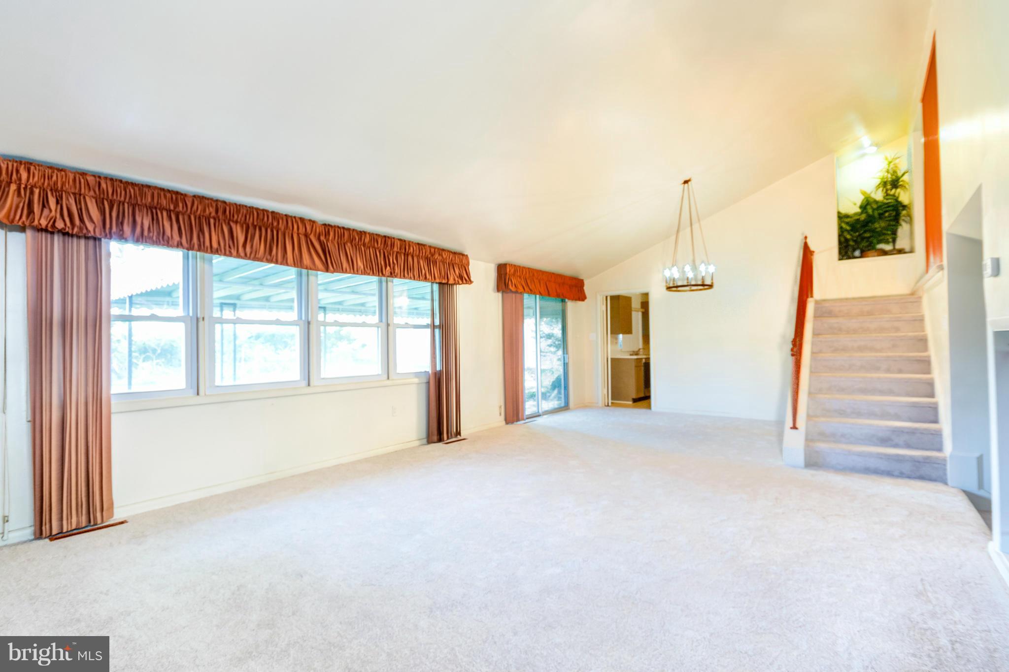 7434 Ricksway Road Pikesville, MD 21208 - Photo 13 of 30 a view of an empty room with a window