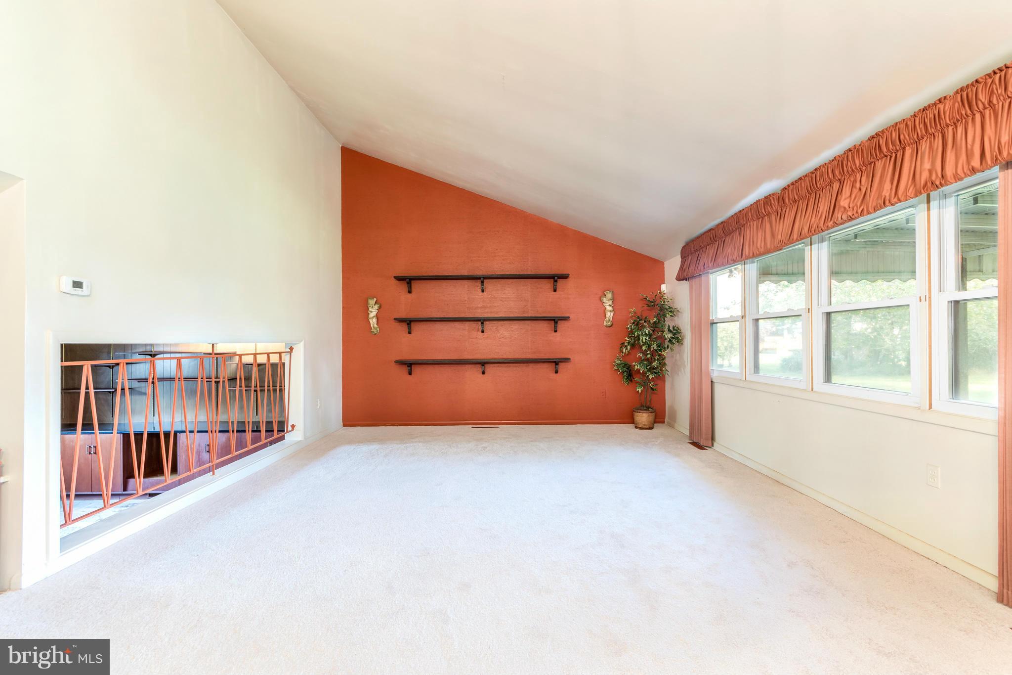 7434 Ricksway Road Pikesville, MD 21208 - Photo 14 of 30 a view of an empty room with a window