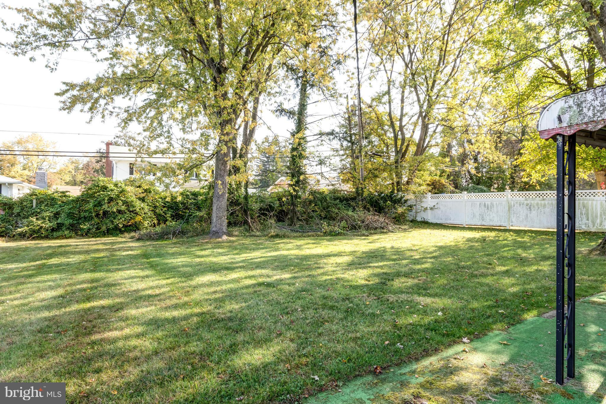 7434 Ricksway Road Pikesville, MD 21208 - Photo 30 of 30 a view of a yard with a large tree
