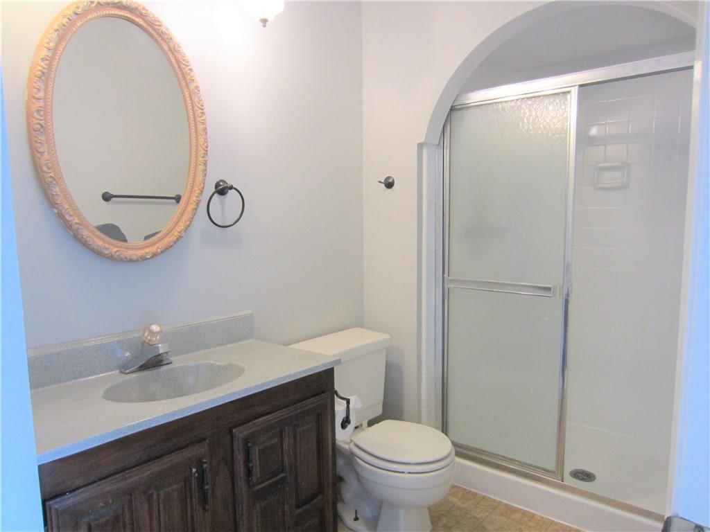 5604 Usher Street The Colony, TX 75056 - Photo 20 of 30 a bathroom with a sink and a mirror