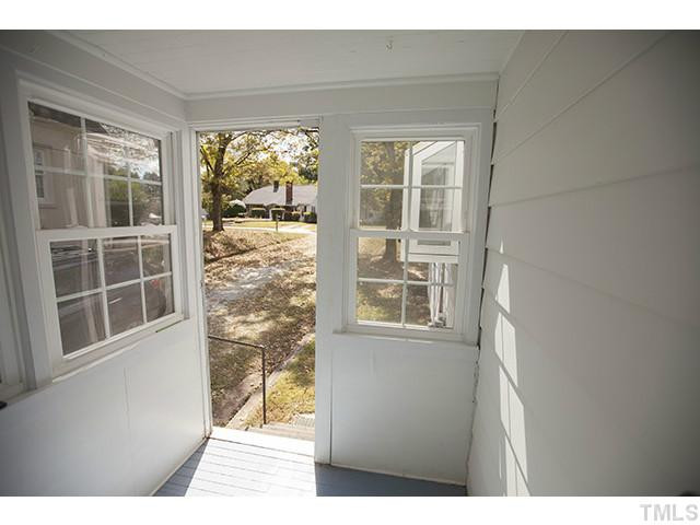 2412 Pickett Road Durham, NC 27705 - Photo 15 of 20 Sunny side porch enters into kitchen.