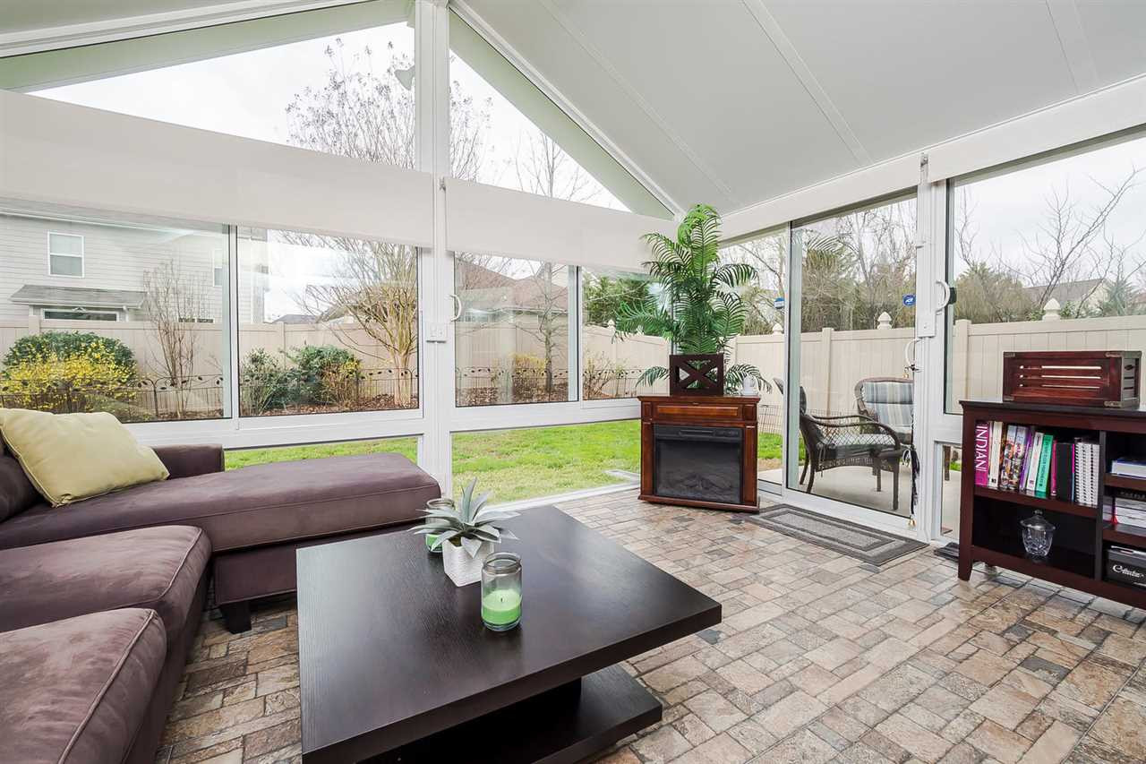 517 Front Ridge Drive Cary, NC 27519 - Photo 11 of 25 Has 2 double exterior doors with build in blinds Sunroom