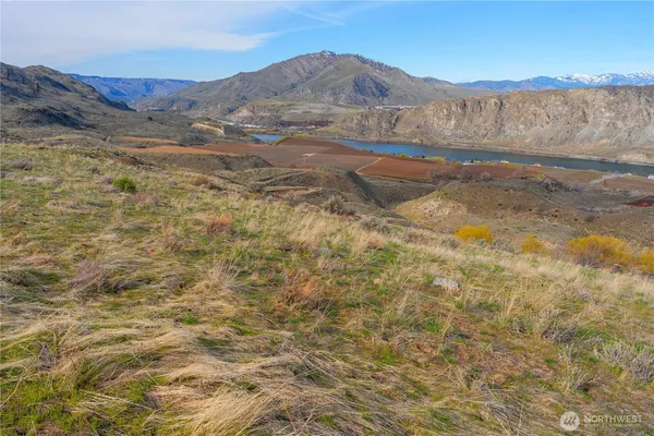 a view of mountain with lake view