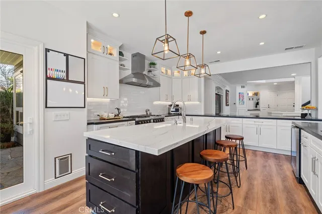 a spacious bedroom with a bed and a large window
