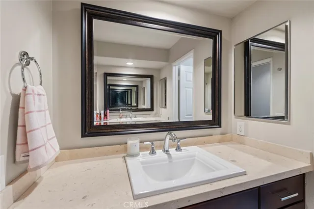 a living room with furniture a rug and a fireplace