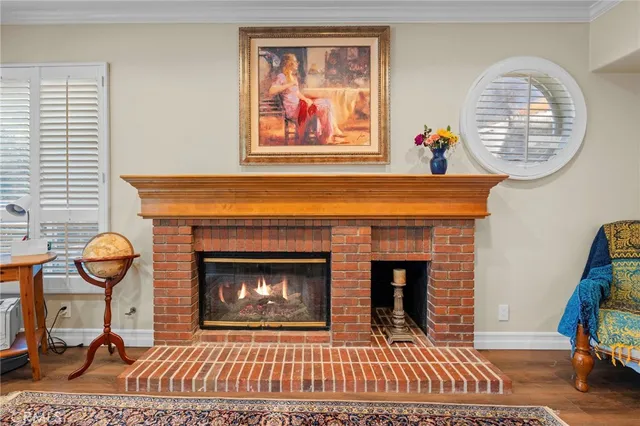 an aerial view of a house with a yard and outdoor seating