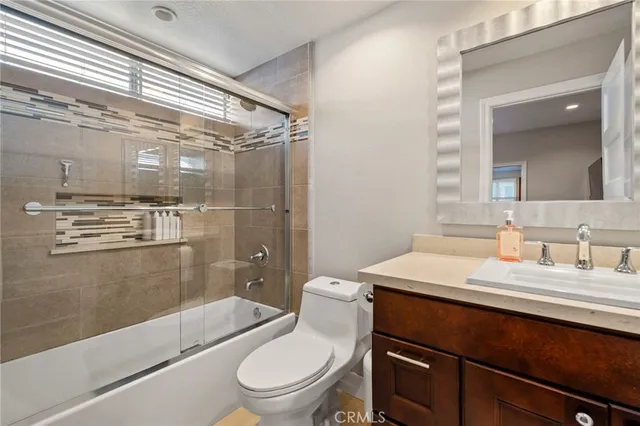 an aerial view of residential house with outdoor space